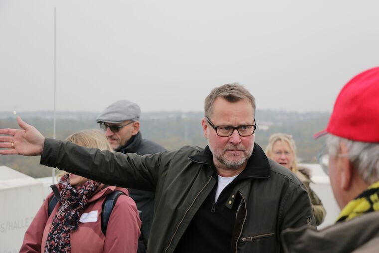 Peter Köddermann, Geschäftsführer Programm von Baukultur NRW, auf der ehemaligen Zeche Zollverein während der Tour zur ökonomischen Transformation von Flächen. Foto: Timo Klippstein